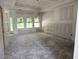 Spacious living room featuring large windows and tray ceiling at 1236 Mill Banks Dr., Longs, SC 29568