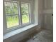 Bright window seat offers view of the lush green outdoors at 1236 Mill Banks Dr., Longs, SC 29568