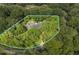 An aerial view of a property with estimated property lines at 1259 Oatland Lake Rd., Pawleys Island, SC 29585