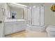 This bathroom features a white vanity and tub, along with a skylight, maximizing the light at 1259 Oatland Lake Rd., Pawleys Island, SC 29585
