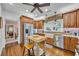 Well-equipped kitchen includes stainless steel appliances, hardwood floors, and a butcher block island at 1259 Oatland Lake Rd., Pawleys Island, SC 29585