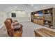 Comfortable living area with large built-in cabinet and display, ideal for media and relaxation at 1259 Oatland Lake Rd., Pawleys Island, SC 29585