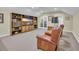 Spacious living room featuring built-in shelves and media center, perfect for relaxing and entertainment at 1259 Oatland Lake Rd., Pawleys Island, SC 29585