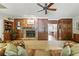 Living room boasts a fireplace with decorative wood paneling and comfortable, upscale seating at 1259 Oatland Lake Rd., Pawleys Island, SC 29585