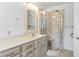 Bright bathroom featuring a single sink and a framed glass shower at 1468 Fox Hollow Way, North Myrtle Beach, SC 29582