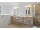 Bright bathroom featuring double sinks, walk-in shower, and soaking tub at 1468 Fox Hollow Way, North Myrtle Beach, SC 29582