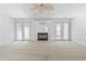 Bedroom featuring a cozy fireplace and access to an outdoor patio at 1468 Fox Hollow Way, North Myrtle Beach, SC 29582