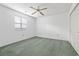 Bedroom featuring a window, closet, plush carpet, and ceiling fan at 1468 Fox Hollow Way, North Myrtle Beach, SC 29582