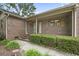 Charming brick front porch with classic columns and lush landscaping, inviting you to step inside at 1468 Fox Hollow Way, North Myrtle Beach, SC 29582