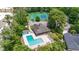 Aerial image of a community clubhouse, pool, and tennis court surrounded by lush trees at 1468 Fox Hollow Way, North Myrtle Beach, SC 29582