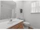 Bright bathroom features a sink, toilet, and a shower-tub combination at 154 Cedar Point Ave., Murrells Inlet, SC 29576