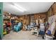 Cluttered garage filled with storage and tools at 154 Cedar Point Ave., Murrells Inlet, SC 29576