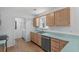 Functional kitchen with stainless steel appliances and lots of cabinets at 154 Cedar Point Ave., Murrells Inlet, SC 29576