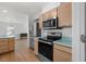 Well-equipped kitchen with stainless steel appliances and lots of natural light at 154 Cedar Point Ave., Murrells Inlet, SC 29576