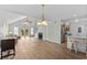 Open-concept layout features a living room with direct access to a modern kitchen at 154 Cedar Point Ave., Murrells Inlet, SC 29576