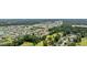 Expansive aerial view highlights the property's location within a neighborhood with lakes and green spaces at 141 Lazy Willow Ln. # 103, Myrtle Beach, SC 29577