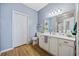 Bright bathroom featuring a vanity, toilet, mirror, and a walk-in shower at 141 Lazy Willow Ln. # 103, Myrtle Beach, SC 29577