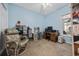 Tranquil bedroom featuring blue walls, natural light and carpeted floor at 141 Lazy Willow Ln. # 103, Myrtle Beach, SC 29577