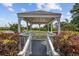 Beautiful gazebo offering a serene space for relaxation and enjoying scenic views of the property at 141 Lazy Willow Ln. # 103, Myrtle Beach, SC 29577