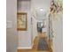 Hallway view showing an open layout connecting to the living room and kitchen area at 141 Lazy Willow Ln. # 103, Myrtle Beach, SC 29577