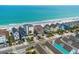 Coastal homes near the ocean, showing street access and lush palm trees at 1615 S Ocean Blvd. # 4, Surfside Beach, SC 29575