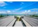 Scenic beach access with benches and a view of the ocean and blue sky at 1615 S Ocean Blvd. # 4, Surfside Beach, SC 29575