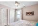 This bedroom features coastal decor, including a crab image and starfish ceiling fan pull at 1615 S Ocean Blvd. # 4, Surfside Beach, SC 29575