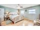 Cozy bedroom features a queen bed, soft lighting from lamps, and wood flooring at 1615 S Ocean Blvd. # 4, Surfside Beach, SC 29575