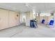 Under-house parking area with storage units and outdoor seating at 1615 S Ocean Blvd. # 4, Surfside Beach, SC 29575