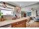 The kitchen area features counters that open to a sitting area at 1615 S Ocean Blvd. # 4, Surfside Beach, SC 29575