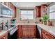 Bright kitchen showcasing stainless steel appliances and ample counter space at 1615 S Ocean Blvd. # 4, Surfside Beach, SC 29575