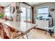 Kitchenette with light countertops, tile backsplash, natural light, seating and ocean views at 1615 S Ocean Blvd. # 4, Surfside Beach, SC 29575
