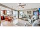 Inviting living room and kitchen featuring hardwood floors, natural light, ocean view and comfortable seating at 1615 S Ocean Blvd. # 4, Surfside Beach, SC 29575