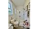 Bathroom featuring a tiled shower and modern fixtures at 17 Carson Creek Dr., Murrells Inlet, SC 29576