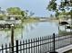 View of the canal with boats on lifts and scenic surroundings at 17 Carson Creek Dr., Murrells Inlet, SC 29576
