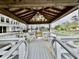 Covered dock area featuring multiple seating areas and views of the waterway at 17 Carson Creek Dr., Murrells Inlet, SC 29576