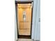 Interior view of an elevator car with wood paneled walls and floors plus stainless steel details at 17 Carson Creek Dr., Murrells Inlet, SC 29576