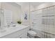 Fresh bathroom with a sleek vanity, vibrant art, and a shower-tub combination at 171 Waterloo Sunset Dr., Longs, SC 29568