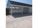 View of the covered pavilion featuring ceiling fans, concrete flooring, and fenced perimeter at 171 Waterloo Sunset Dr., Longs, SC 29568