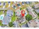 Aerial view showing the community layout, pool, parking, and green spaces at 1870 Auburn Dr. # 22A, Surfside Beach, SC 29575