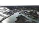 Aerial view showing boats docked at a pier in a waterfront community at 1870 Auburn Dr. # 22A, Surfside Beach, SC 29575