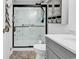 Updated bathroom features a walk-in shower with glass doors and modern fixtures at 1870 Auburn Dr. # 22A, Surfside Beach, SC 29575