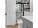 Updated bathroom features a walk-in shower with glass doors and modern fixtures at 1870 Auburn Dr. # 22A, Surfside Beach, SC 29575