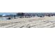 Wide view of a crowded public beach on a sunny day at 1870 Auburn Dr. # 22A, Surfside Beach, SC 29575