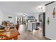 Inviting living space with wood-look floors, slider to deck, and bar seating at 1870 Auburn Dr. # 22A, Surfside Beach, SC 29575