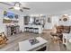 Open living space with bar seating, wood floors, and a view into the dining area at 1870 Auburn Dr. # 22A, Surfside Beach, SC 29575