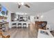 Open living space with updated kitchen, bar seating, and neutral finishes at 1870 Auburn Dr. # 22A, Surfside Beach, SC 29575