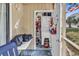 View of a laundry closet on a screened patio overlooking lush grounds at 1870 Auburn Dr. # 22A, Surfside Beach, SC 29575