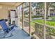 Comfortable screened patio with laundry closet and views of courtyard at 1870 Auburn Dr. # 22A, Surfside Beach, SC 29575