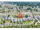 Comprehensive aerial view highlighting complex, parking, community, and the surrounding landscape with ponds at 2020 Cross Gate Blvd. # 203, Surfside Beach, SC 29575